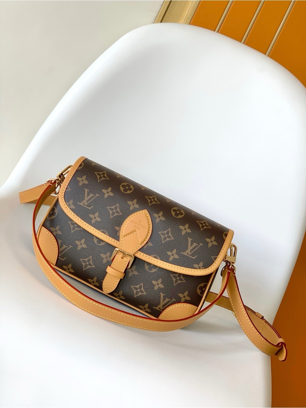 Louis Vuitton Monogram Canvas Buckle Shoulder Bag in Brown and Tan